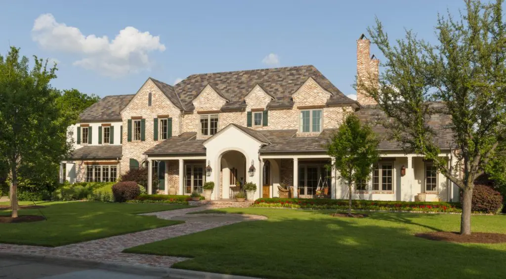 A large house with a lot of windows and doors